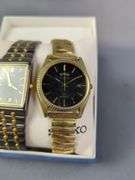 Seiko Black Toned Stainless Steel+Base Metal Watch, In Box With Spare Links, And Seiko SQ Gold Toned Base Metal+Stainless Steel Back Watch