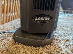 Household Items: Ironing Board, Lasko Heater, Gate, Picture, Laundry Basket & More