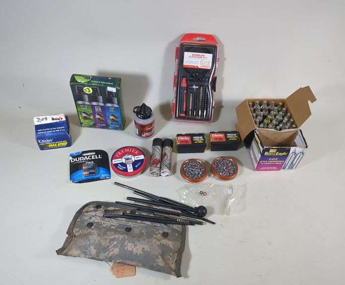 Air Rifle Assortment Including BBs, Pellets, CO2 Cartridges, And Air Gun Cleaning Supplies image