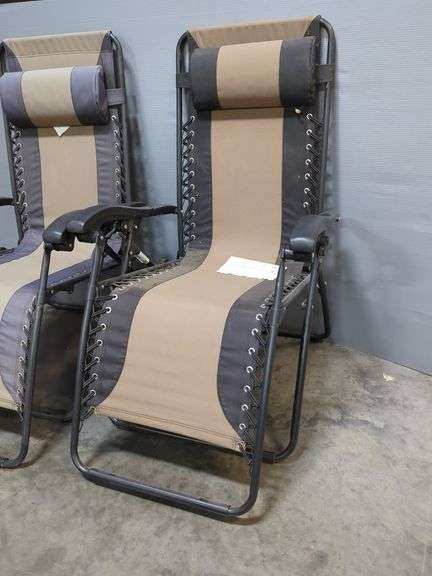 Two Adjustable Zero Gravity Lounge Chairs