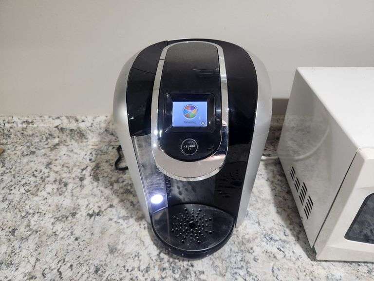 Keurig 2.0 Coffe Maker, Sunbeam Model SM0701A7E Microwave, And GE Model JES1145SH1SS Microwave, All Power On