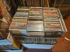 Massive Music Media Collection Including over 70,000 Record Albums, Cassette Tapes, And CDs