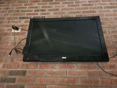 RCA Wall Mounted Television, And Toshiba DVD Player, Bidder Responsible For Proper Disassembly, Please Bring Proper Tools And Labor To Safely Remove