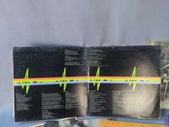 Collection of 12" Vinyl Records: Pink Floyd, The Doors, REO Speedwagon, and More