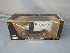 Motor Max Platinum 1925 Ford Model T Paddy Wagon Diecast and an ERTL 1918 Ford Model T Van Replica