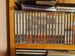 Massive Music Media Collection Including over 70,000 Record Albums, Cassette Tapes, And CDs