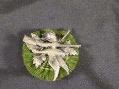 German Suvenirs Including Brooches And Carved Eidelweiss Celluloid Flowers