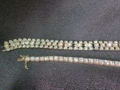 Costume Jewelry Including Necklace, Bracelets, and Brooches