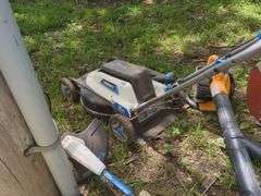 Lawn Care Equipment Assortment Including Hart Mower, String Trimmer, and Blowers