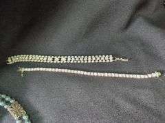Costume Jewelry Including Necklace, Bracelets, and Brooches