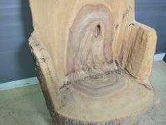 Hand-Carved Wood Log Chair With Face Detail