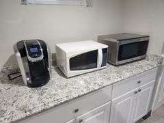 Keurig 2.0 Coffe Maker, Sunbeam Model SM0701A7E Microwave, And GE Model JES1145SH1SS Microwave, All Power On
