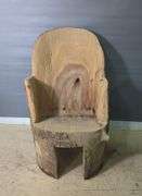 Hand-Carved Wood Log Chair With Face Detail
