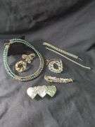 Costume Jewelry Including Necklace, Bracelets, and Brooches