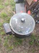 Camping Gear Including Fishing Rods, Net, Cooking Pot, and More