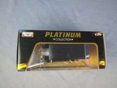 Motor Max Platinum 1925 Ford Model T Paddy Wagon Diecast and an ERTL 1918 Ford Model T Van Replica