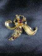 Costume Jewelry Collection: Necklace, Brooches, Bracelet, and Earrings