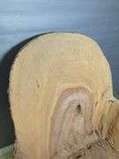 Hand-Carved Wood Log Chair With Face Detail