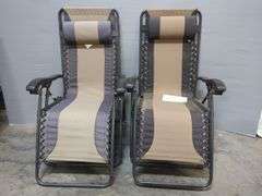 Two Adjustable Zero Gravity Lounge Chairs