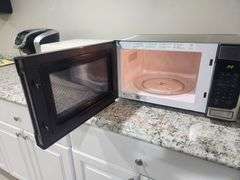 Keurig 2.0 Coffe Maker, Sunbeam Model SM0701A7E Microwave, And GE Model JES1145SH1SS Microwave, All Power On
