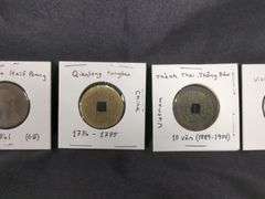 Foreign 19th Century Coin Collection Including 1861 Great Britain Victoria Half Pennies, Qty 2, 1854 France Napoleon III 10 Centimes Coin, 1700 China Qianlong Tonbao Coin, and 1889 Vietnam 10 Van Coin
