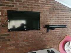 RCA Wall Mounted Television, And Toshiba DVD Player, Bidder Responsible For Proper Disassembly, Please Bring Proper Tools And Labor To Safely Remove