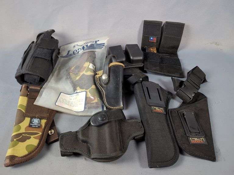 Nylon And Leather Holsters, Brands Include Smith & Wesson, Bianchi, Uncle Mike's, Don Hume, And More, Total Qty 7, Fobus Plastic Duel Mag Holder, And Ace Nylon Duel Mag Holder With 1 Metal Mag image