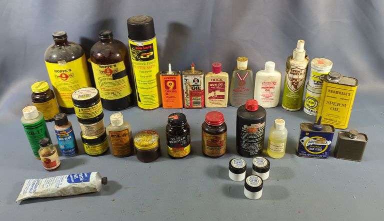 Powder Solvent, Gun Oils, Gun Blue, RB-17, Bore Cleaner, Scent Shield, And More, Contents Of Crate, Some Opened And Partial Bottles image