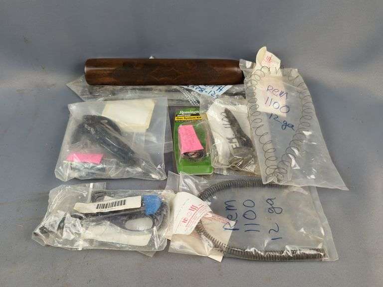 Remington 878/1100 Parts Assortment, Including Springs, Trigger Group, Foregrip, And More image