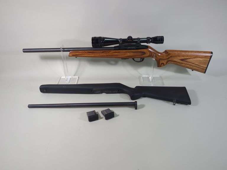 Remington 597 Magnum .22 Win Mag Rifle SN# 2980783M, Heavy Barrel, 4-12x Redfield Scope, Extra 17 HMR Barrel, 3 Total Mags, Extra Stock image