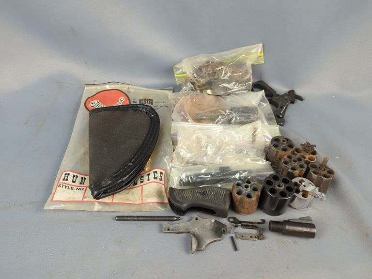 Revolver Parts, Includes Cylinders, Trigger Groups, Hammers, Springs, Grips, And More, And Hunter Handgun Soft Case image