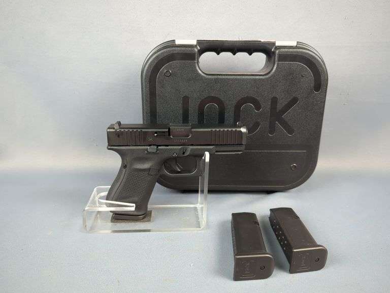 Austria Glock 23 Gen 5 .40 S&W Pistol SN# CECB629, 3 Total Mags, Extra Grips, Speed Loader, Paperwork , In Hard Case image