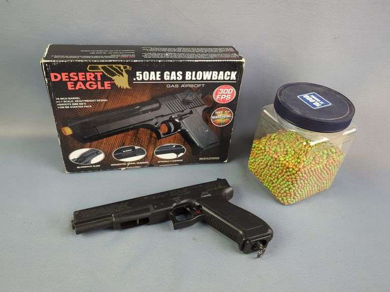 Desert Eagle .50AE Gas Blowback Airsoft Pistol, Daisy Power line Model 1700 BB Pistol, And Crosman Airsoft 6mm Camo Ammo, Uncounted image