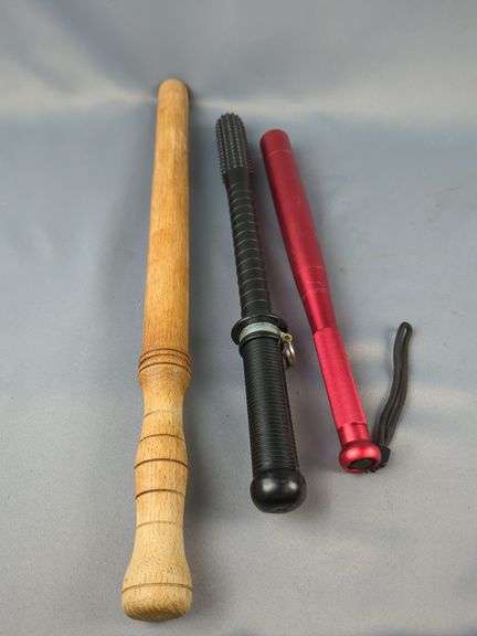 Flashlight Baton And Wood And Rubber Batons image