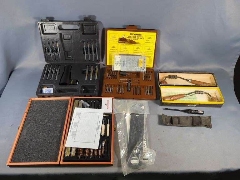 BSA Bore Sighter Scope Alignment Device, Wheeler Savage Nut Wrench, Gunline Tools Barrel Bedding Tool, Qty 2, Brownells Drill & Tap Kit No. 2 With Screw Checker, Winchester Deluxe Universal Gun Cleaning Kit, And Bore Sighter image