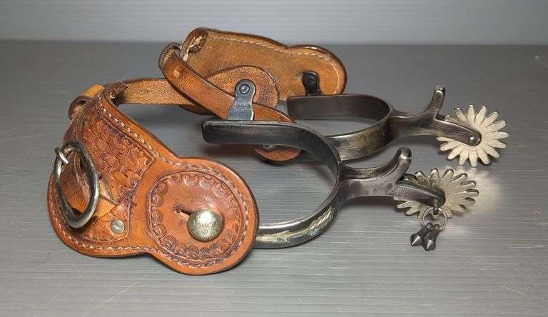 Spurs With Tooled Leather Spur Straps, Qty 2, Swing Arm Is Marked Colorado, Heelband Has Arrow Decoration image