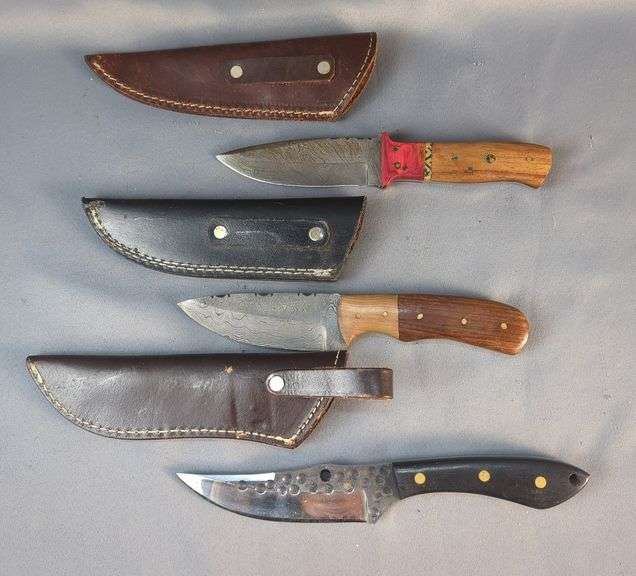 Damascus Steel Knife With Wood And Red Wood Handle, 4.5" Blade, Damascus Steel Knife With Wood Handle, 4.25" Blade, And Knife With Black Wood Handle, All In Leather Sheaths image