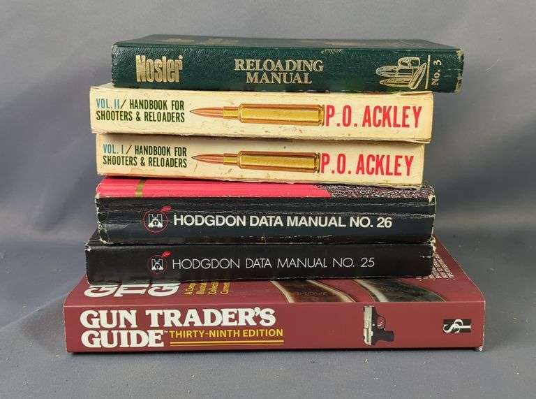 Reloading, Powder, And Price Guide Books, Includes Nosler Reloading Manual, Handbook For Shooters & Reloaders Vol 1 & 2, Hodgdon Manual No. 25 & 26, And Gun Trader's Guide image