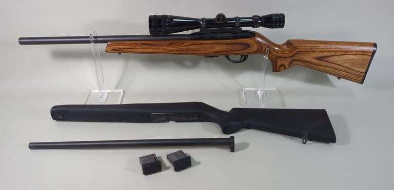 Remington 597 Magnum .22 Win Mag Rifle SN# 2980783M, Heavy Barrel, 4-12x Redfield Scope, Extra 17 HMR Barrel, 3 Total Mags, Extra Stock image