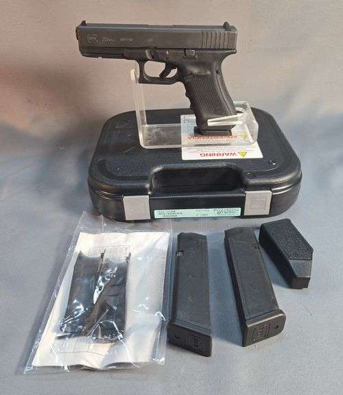 Austria Glock 22 Gen 4 .40 Cal  Pistol SN# RM2564, 3 Total Mags, Speed Loader, Back Straps, Paperwork, In Hard Case image