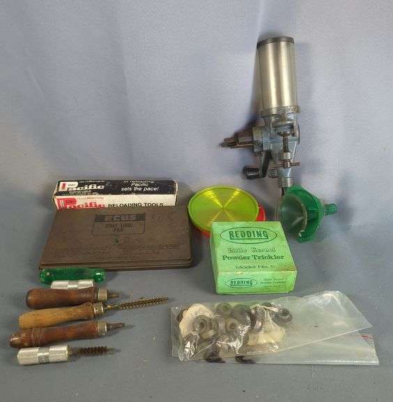 Gun Powder Measure, Redding Little Kernal Powder Trickler, Lube Pad, Lube Brushes, Reamers, Primer Trays, Various Size Shell Holders, And Pacific Bullet Puller image