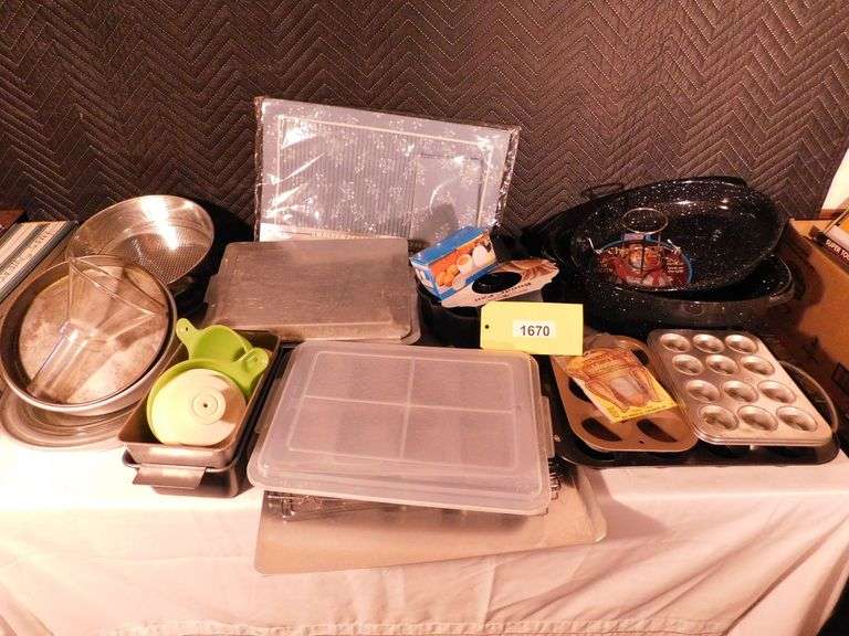 Lot of various baking items, cookie sheets, cake, muffin pans, placemat set, roast pan, chicken can rack