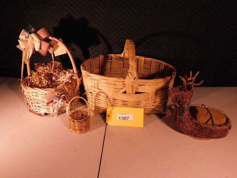 Lot of 4 Baskets 1 Reindeer wicker basket 1 circular single handle wicker basket 1 circular single handle picnic basket 1 large oval single handle picnic basket
