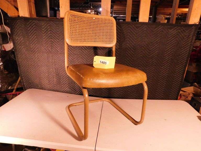 Vintage metal chair with lattice back