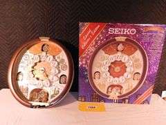Seiko Special Collectors edition Clock w/24 melodies made w/16 Swarovski crystals, glass and plastic broken