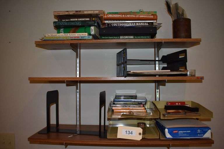 Office supplies, hunting and fishing DVDs, stapler, staples, books