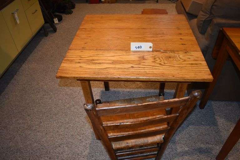 29 1/2" x 29" x 30" nice solid wood table with chair
