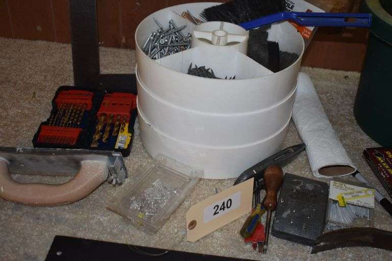 Tools, snow shovel, square, drill bits, screw drivers, crow bar, stapler, screws, saw horses