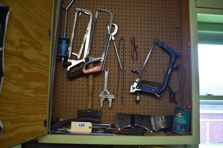 hand tools, contractor bags, welding goggles, sprayer, buckets, chain