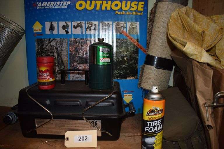 Camper top tent, bait box, fish light, tackle box, flow troll, waders, insect repellant, outhouse pack in blind